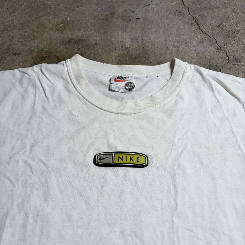 Vintage 90s Nike White Cutoff Sleeveless T-Shirt with Rubber Logo Patch